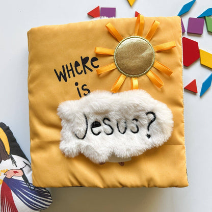 Yellow pillow with sun design and 'Where is Jesus?' text on a colorful background