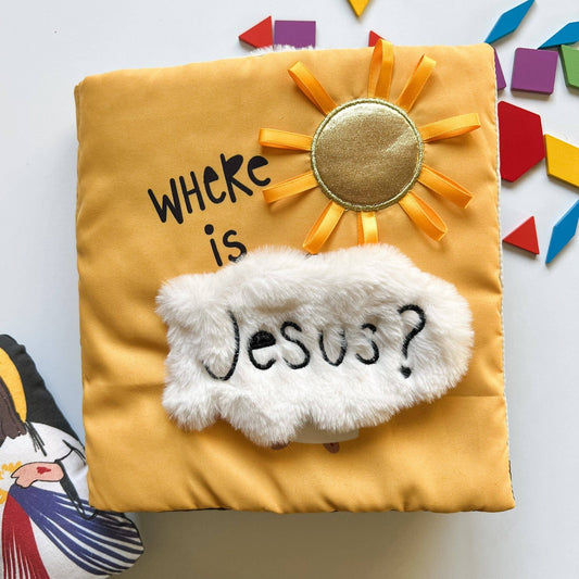 Yellow pillow with sun design and 'Where is Jesus?' text on a colorful background