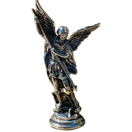 Metallic Michael the Archangel figurine with wings spread on a white background