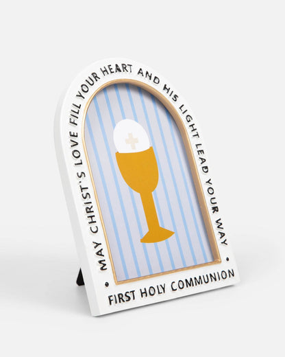 Decorative plaque with a chalice illustration and text for First Holy Communion on a white background
