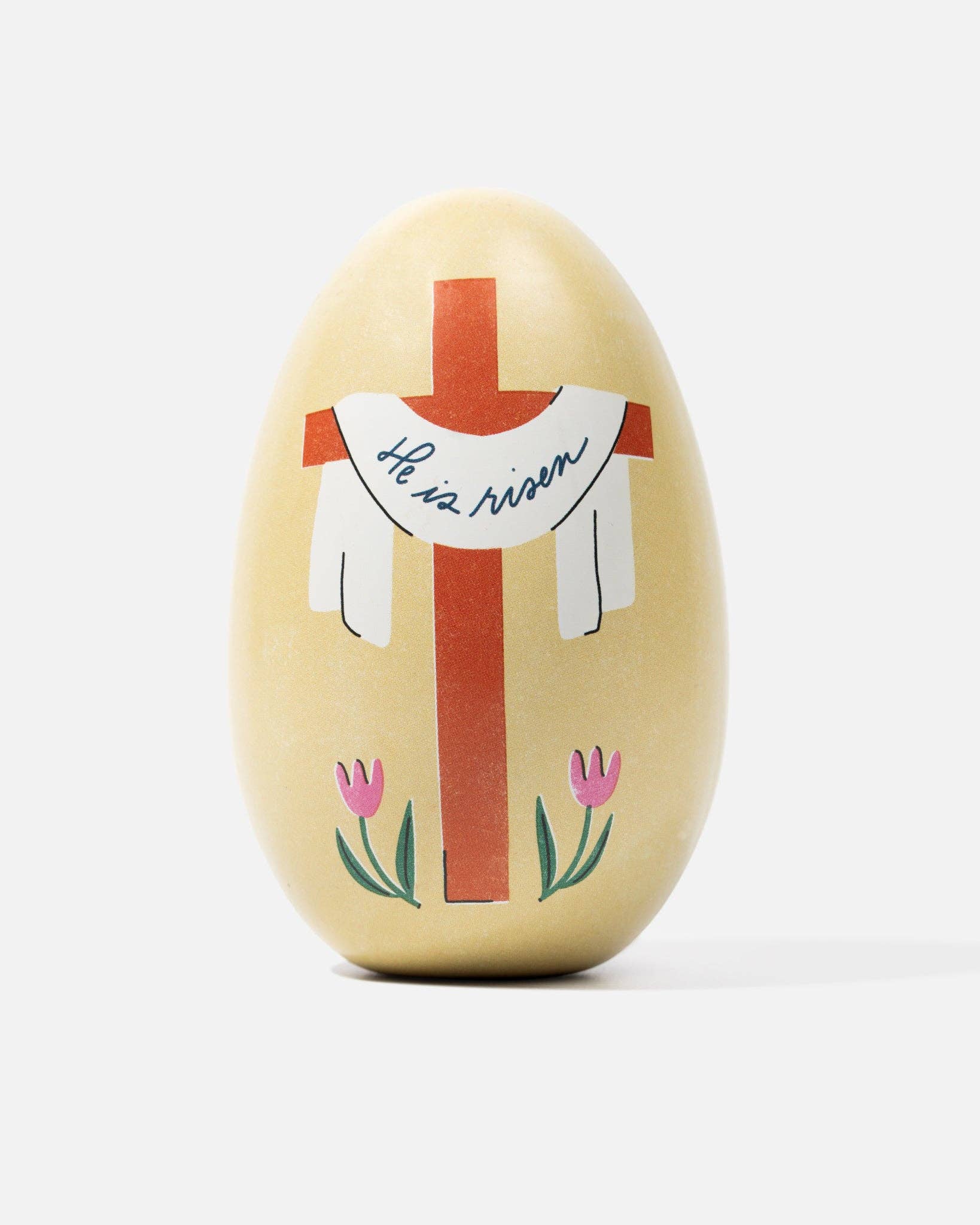 Decorative Easter egg with a cross and text on a white background