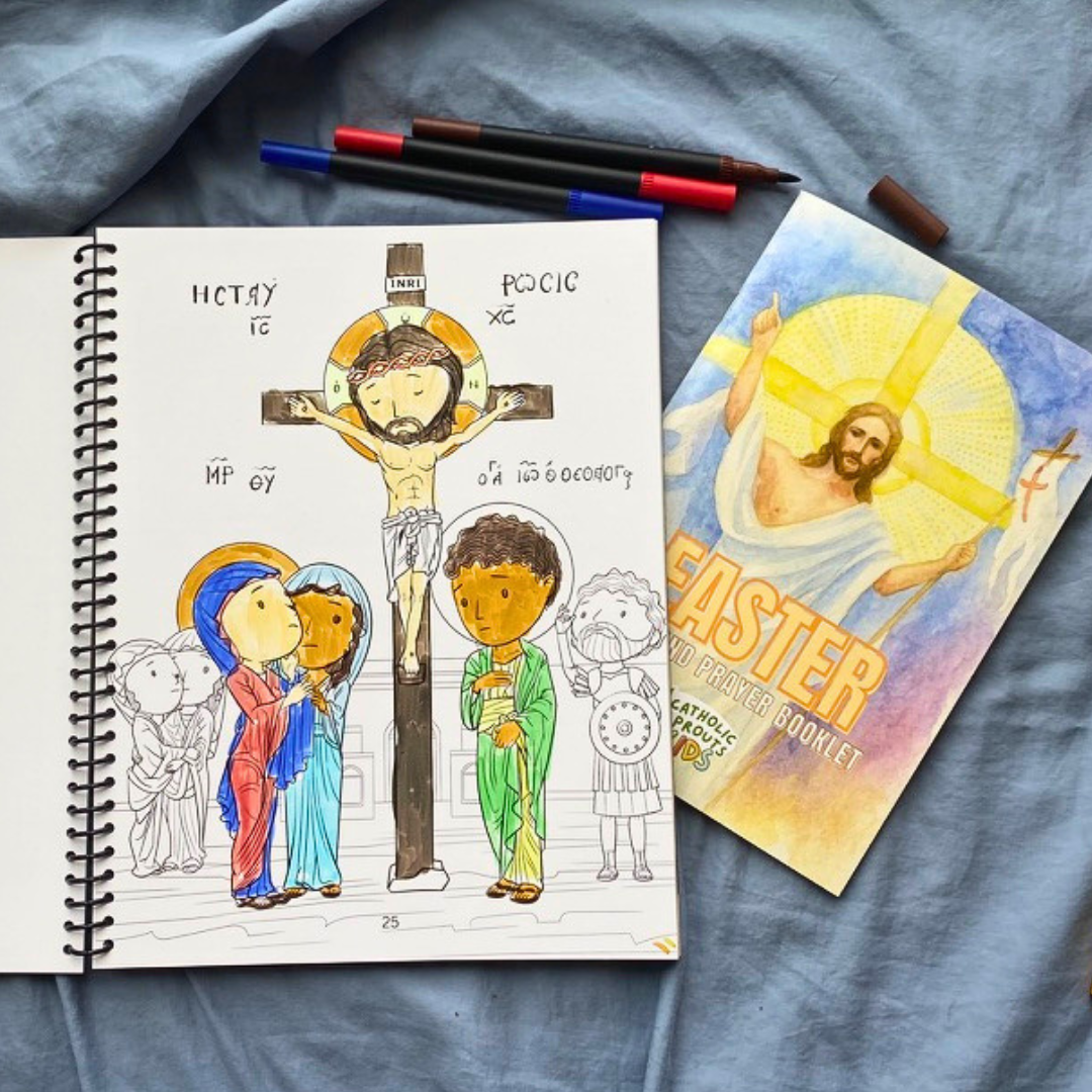 Coloring book with religious illustrations on a blue fabric background