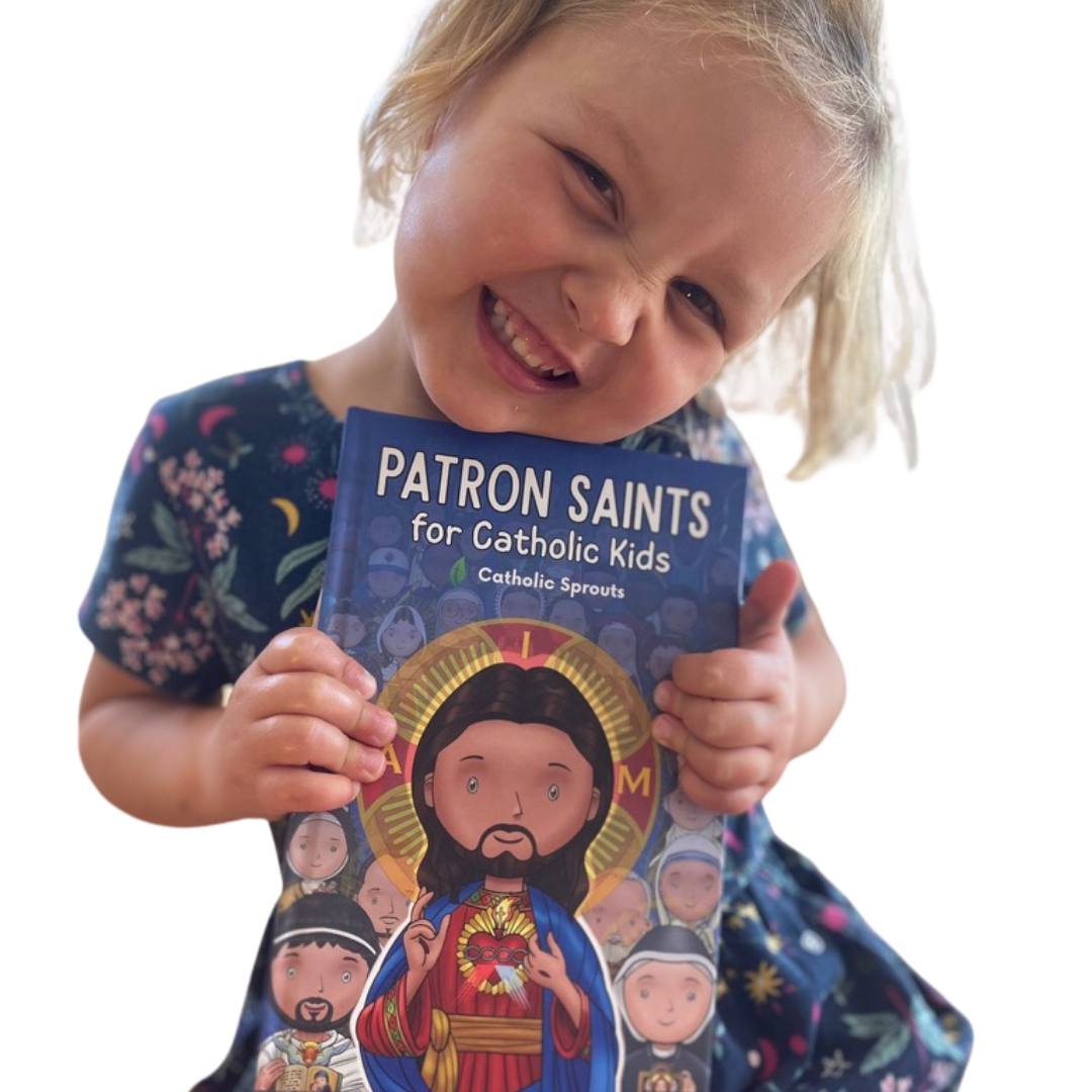 Child holding a book titled 'Patron Saints for Catholic Kids' by Catholic Sprouts.